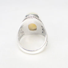 Load image into Gallery viewer, Handmade Sterling Silver Ring set with Ethiopian Opal
