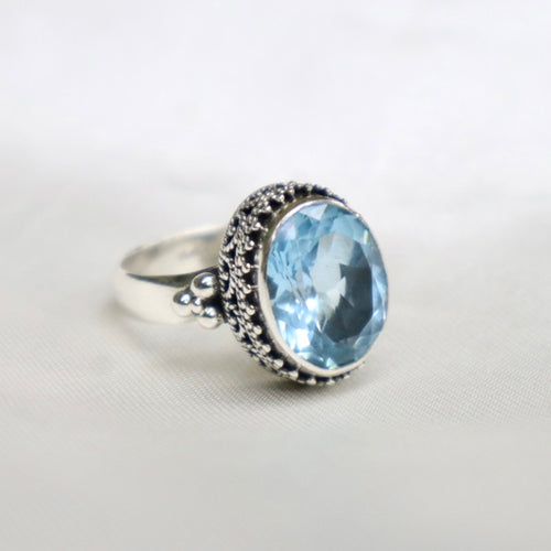 Sterling Silver Bali-Design Ring with Bead Accents set with Faceted Blue Topaz - The Gem Mine