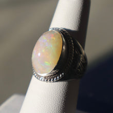 Load image into Gallery viewer, Handmade Sterling Silver Ring set with Ethiopian Opal
