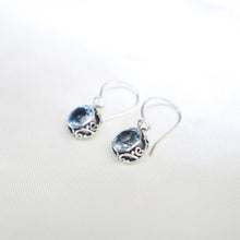Load image into Gallery viewer, Sterling Silver Swirl Design Dangle Earrings set with Faceted Blue Topaz - The Gem Mine
