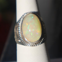 Load image into Gallery viewer, Handmade Sterling Silver Ring set with Ethiopian Opal
