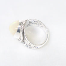 Load image into Gallery viewer, Handmade Sterling Silver Ring set with Ethiopian Opal
