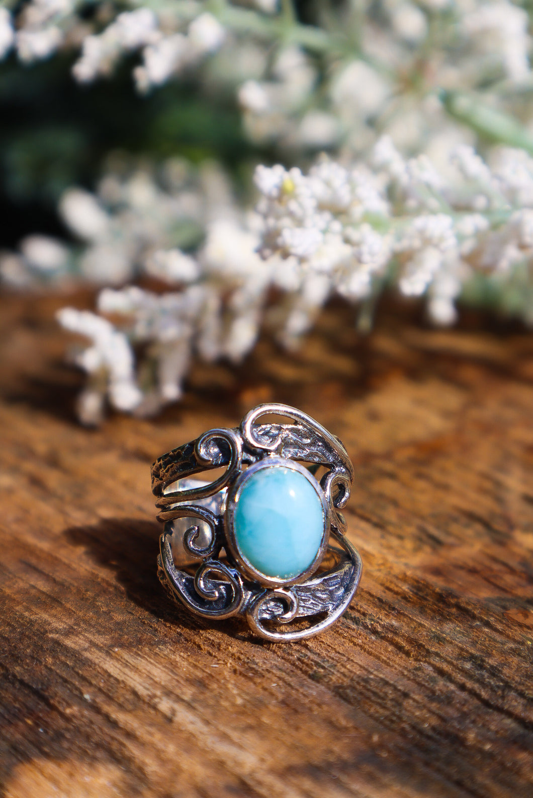 Handmade sterling silver swirl design ring with larimar stone -Front View